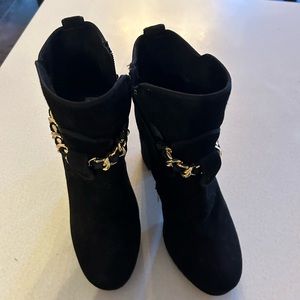 Karl Lagerfeld black ankle boots with gold chain.